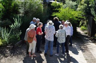 Members gathering for Rainforest Garden Visit